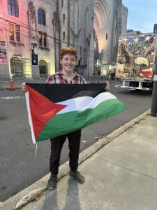 A protester outside of the Walz rally on Oct. 25.