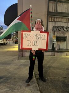 A protester outside of the Walz rally on Oct. 25.
