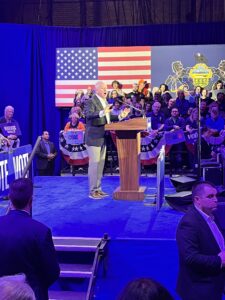 Minnesota Governor Tim Walz speaking at a rally in Scranton, PA. 