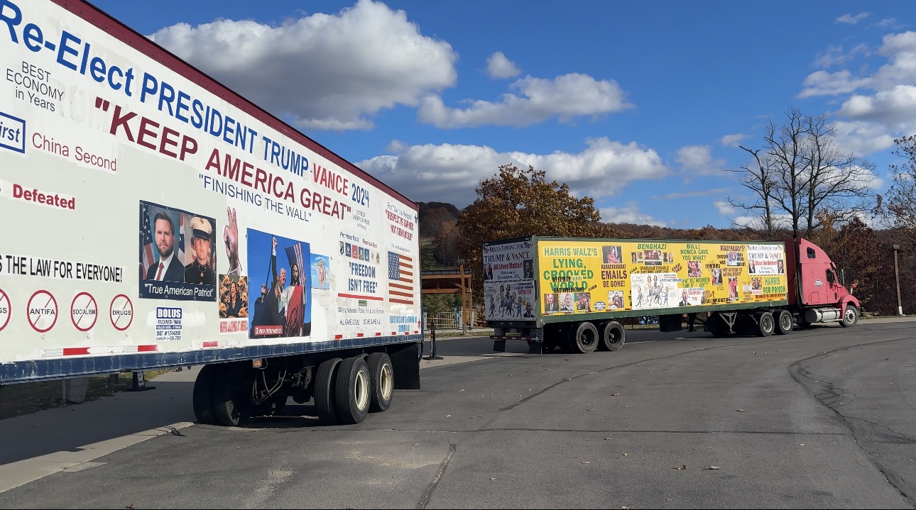 18-wheeler trailer truck plastered with GOP campaign materials.