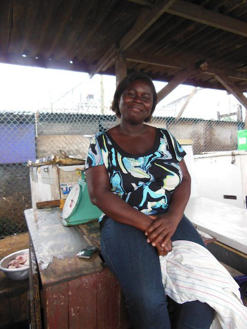Akos sells her typically fresh fish from coolers in what is called the European Market, but she thaws and sells frozen catches from the cold stores when supply is low. The European Market is a quieter, cleaner inlet of the market frequented by expatriates and European immigrants who prefer their fish fresh, and cleaned in front of them.