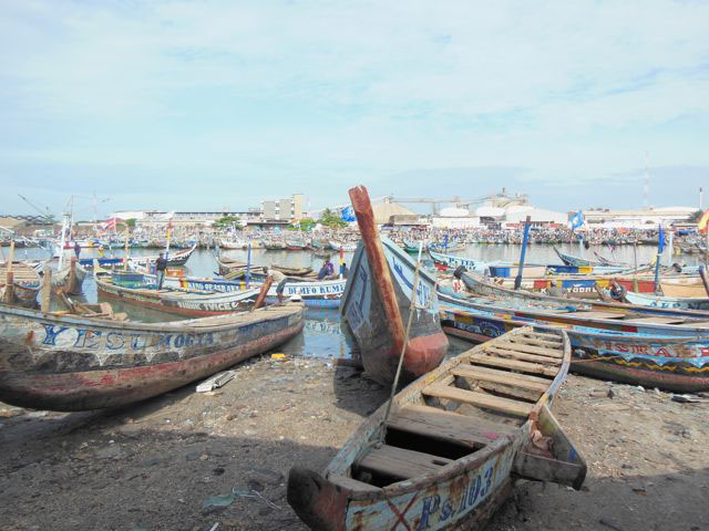 Ghanaian fishermen catch local seafood like red snapper and cassava fish off the country’s shores on these painted wooden boats. Supply from these is seasonal and subject to weather conditions. The market for fish is becoming more dependent on trawling boats and industrial fishing ships docked off the haHarbour, which travel as far as Guinea and Sierra Leone for their catches. 