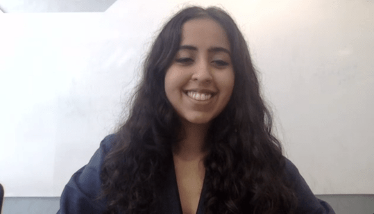 Darkhaired woman smiling