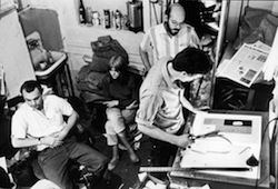 John Wilcock (at left), Allen Katzman (in striped shirt), and Walter Bowart prepare a layout on Aug. 25, 1966