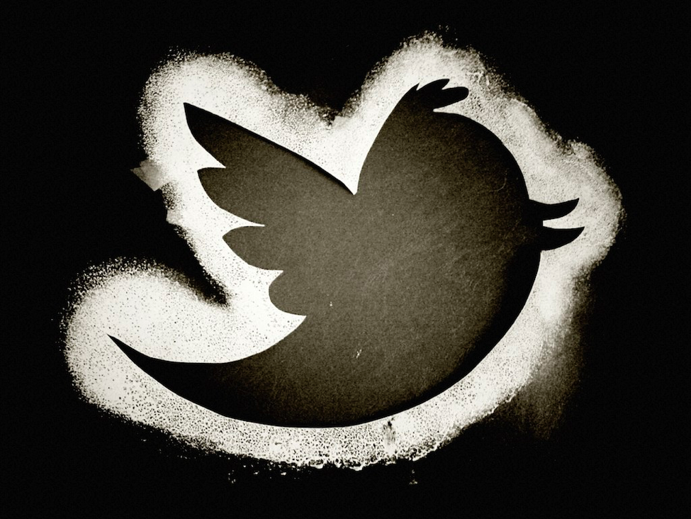 Black and white artistic rendering of Twitter logo